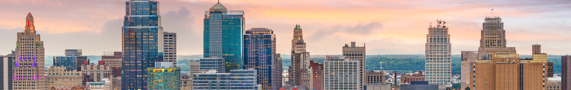 Kansas City, Missouri, USA downtown cityscape at twilight.