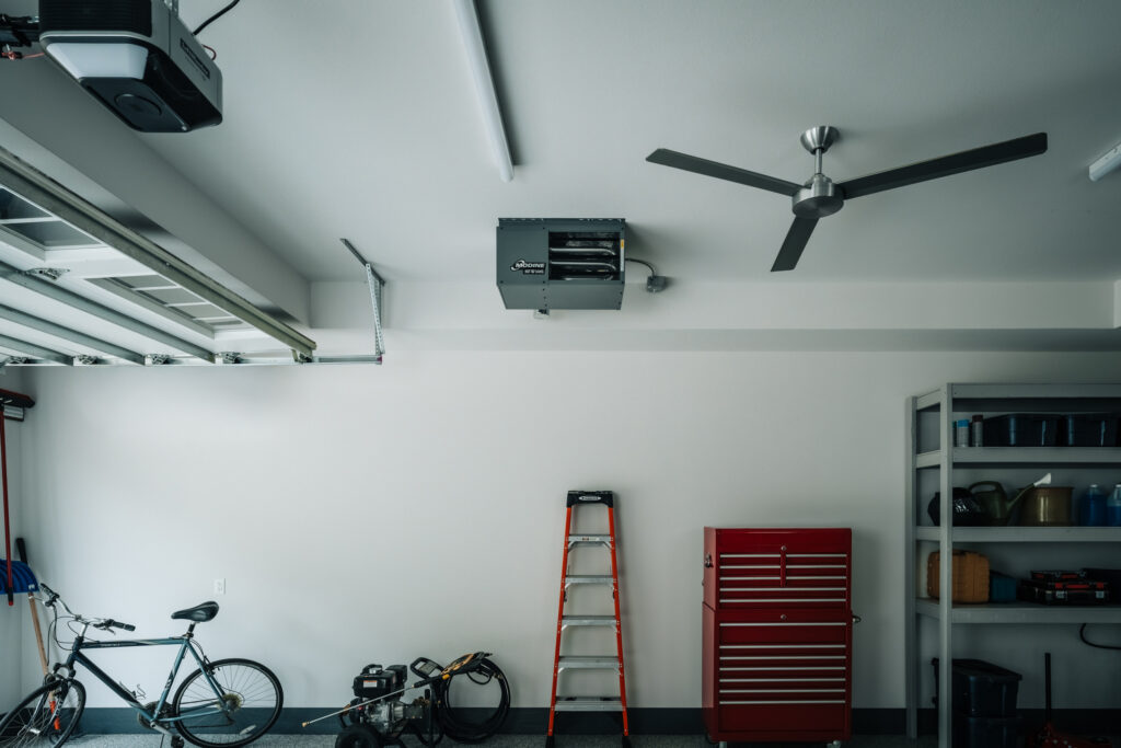 Modine hot dawg power-vented gas-fired unit heater, model hd45, ceiling mounted in a residential garage