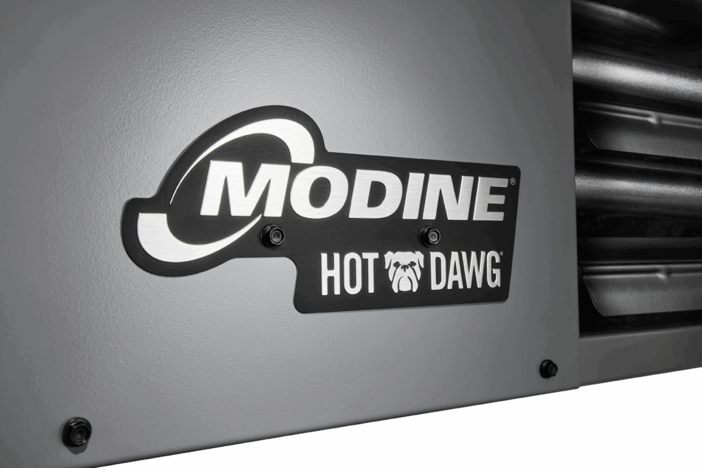 Modine how dawg gas-fired and power-vented unit heater, sleek gray powder coated finish with black and brushed stainless steel logo decal detail view